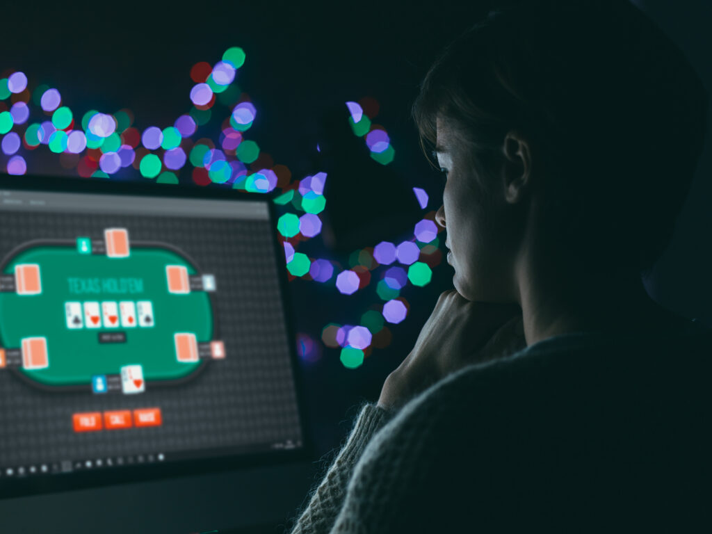 Player engaging in online poker, highlighting the need for cyber security in digital gaming platforms